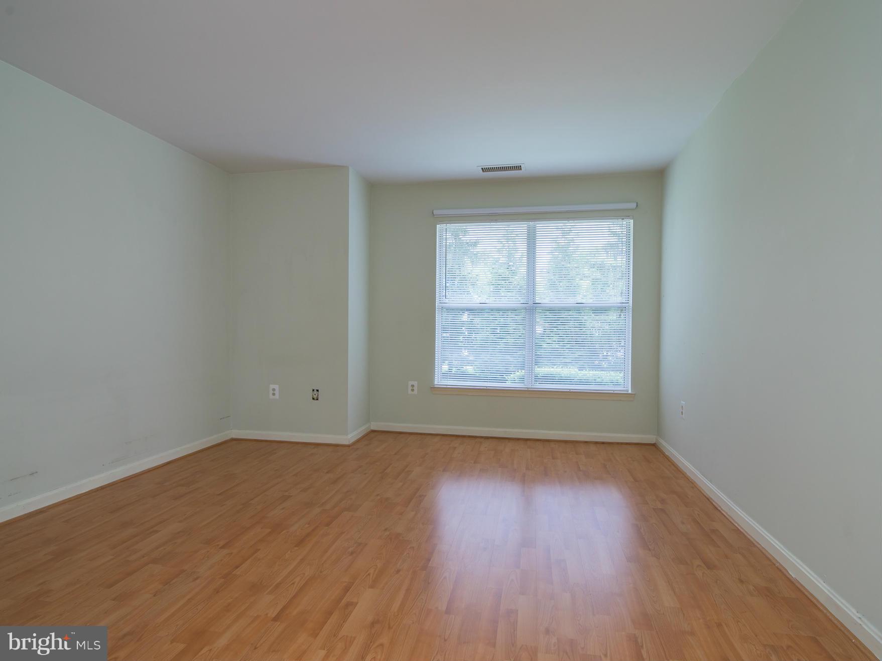 20576 Snowshoe Square, Unit 102 Ashburn, VA 20147 - Photo 16 of 30 Large Master Bedroom with lake view