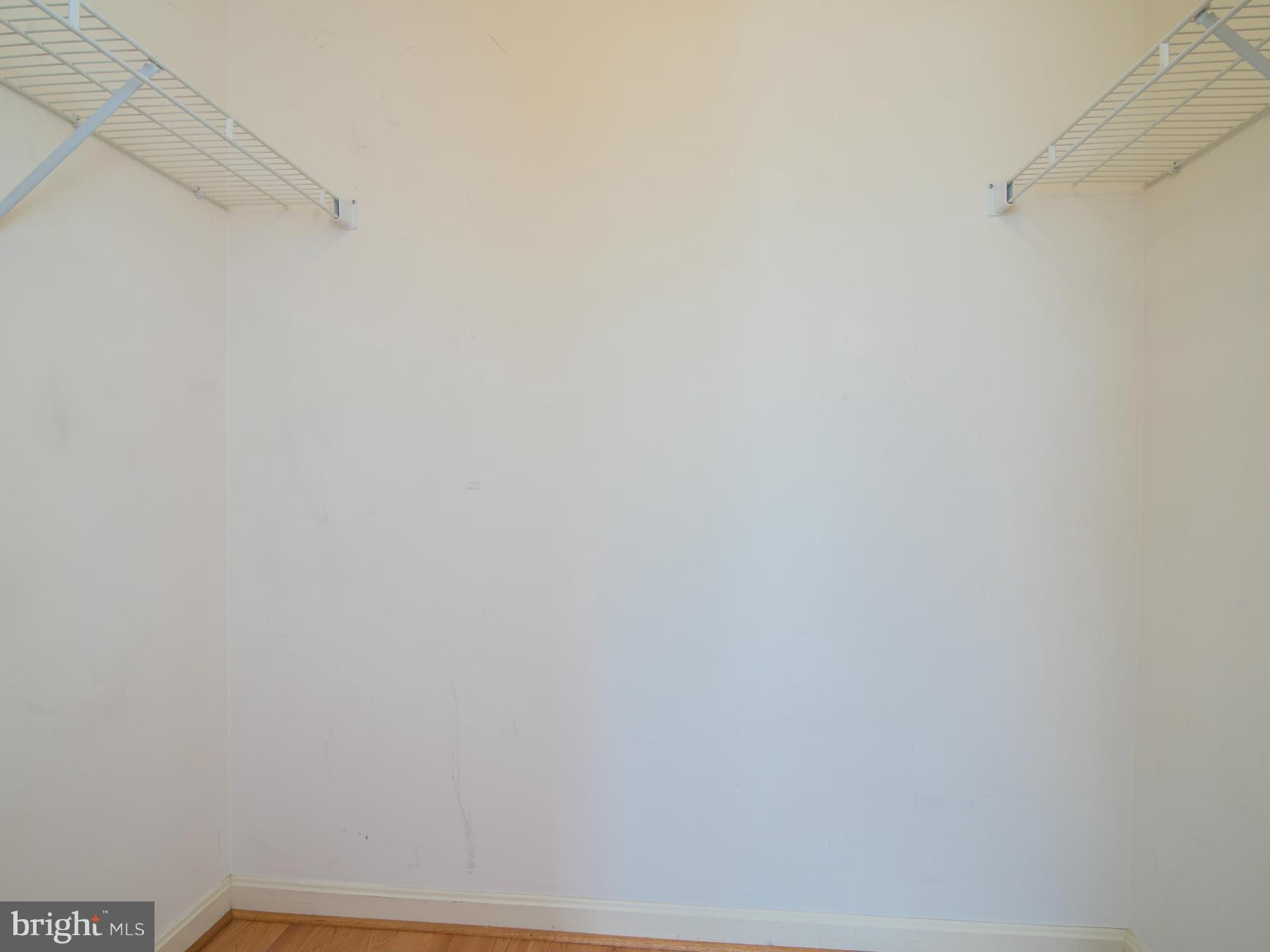 20576 Snowshoe Square, Unit 102 Ashburn, VA 20147 - Photo 18 of 30 Walk-in closet