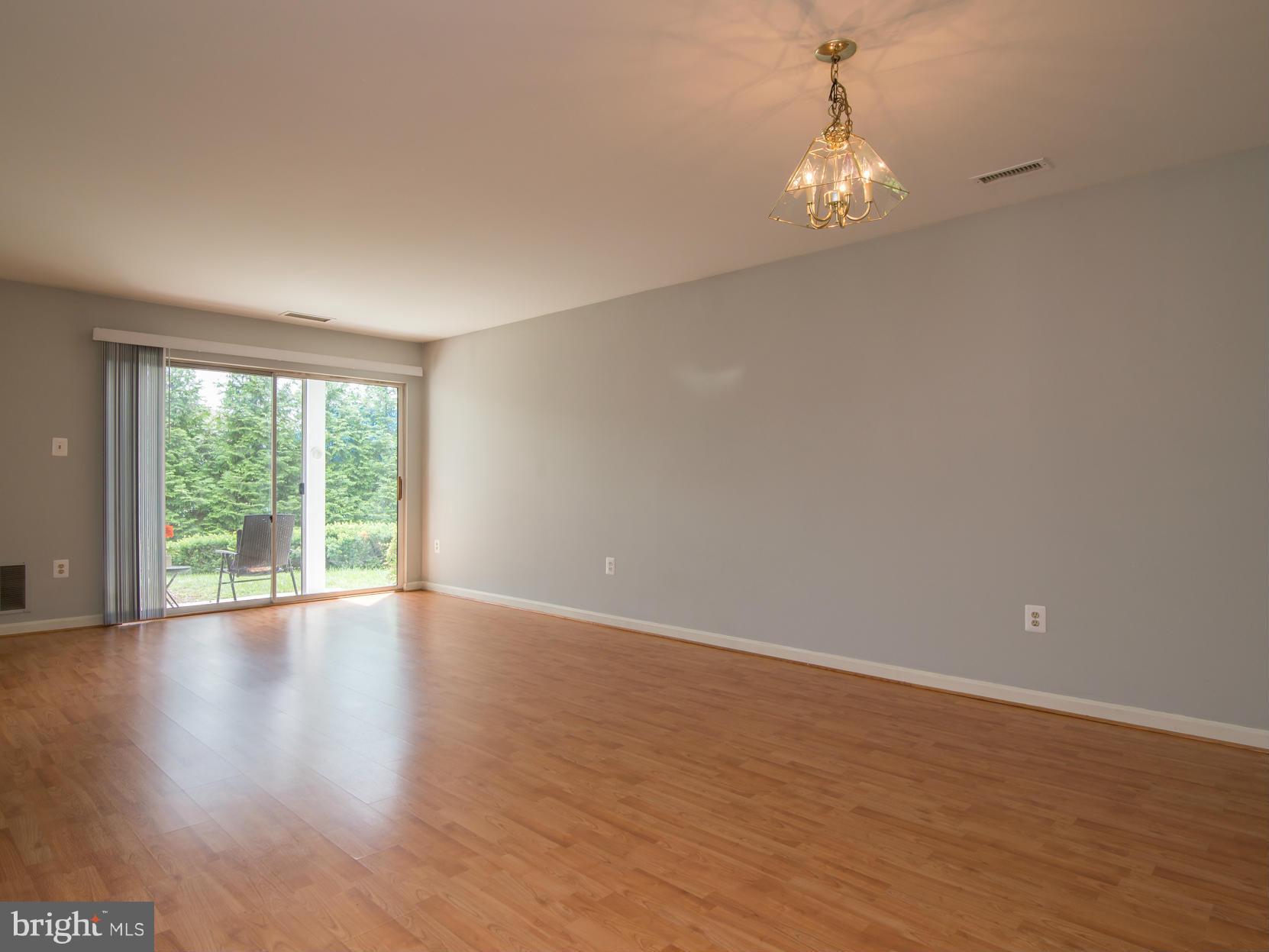20576 Snowshoe Square, Unit 102 Ashburn, VA 20147 - Photo 19 of 30 Living Room