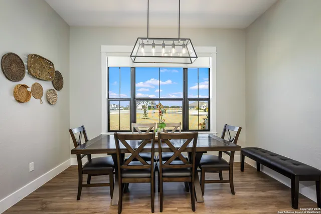 a kitchen with stainless steel appliances a refrigerator and a stove