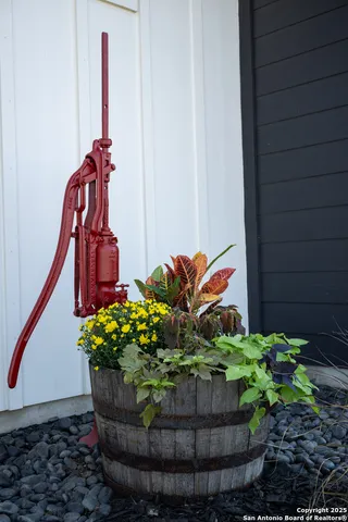 a view of a house with a yard and garage