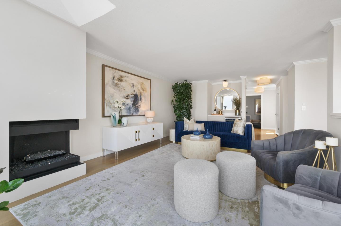 415 Roberts Road Pacifica, CA 94044 - Photo 19 of 69 a living room with furniture a fireplace and a flat screen tv