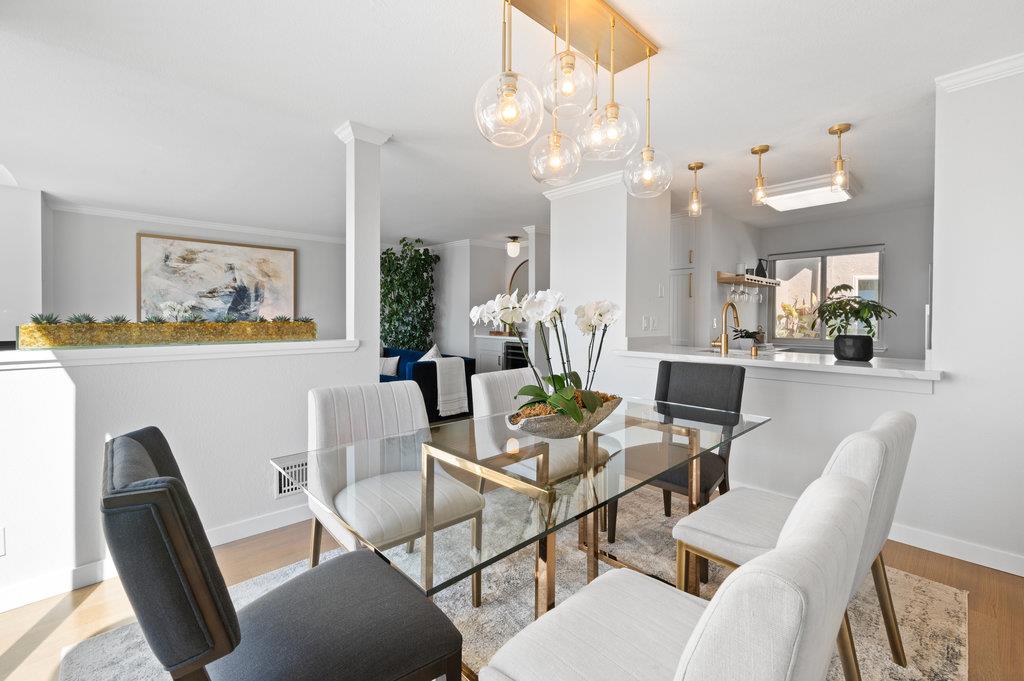 415 Roberts Road Pacifica, CA 94044 - Photo 23 of 69 a view of a dining room with furniture and a chandelier
