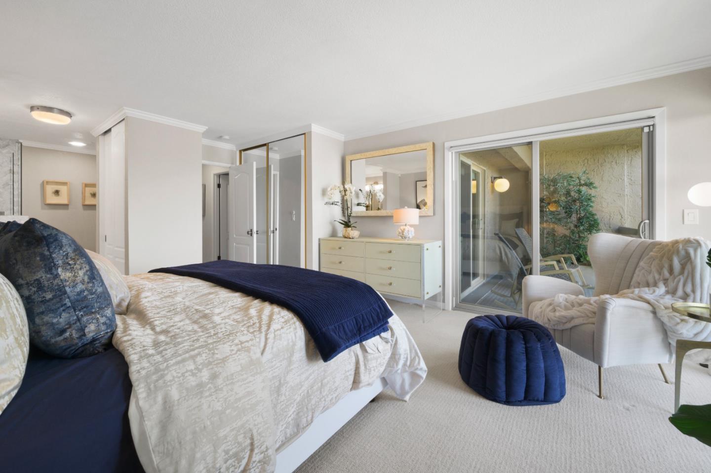 415 Roberts Road Pacifica, CA 94044 - Photo 39 of 69 a spacious bedroom with a bed and glass door