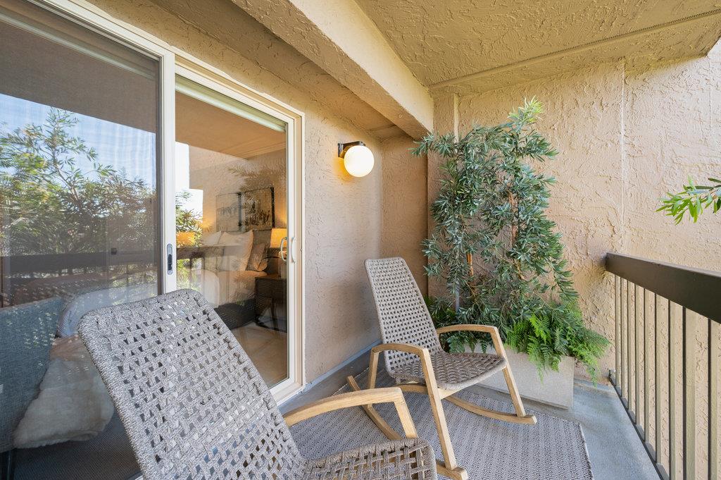 415 Roberts Road Pacifica, CA 94044 - Photo 40 of 69 a view of balcony with wooden floor and outdoor seating