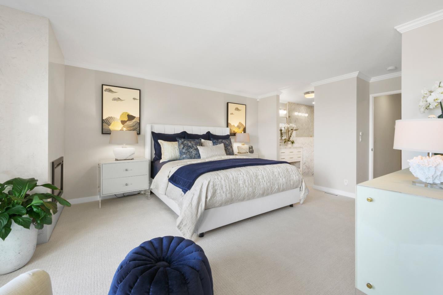 415 Roberts Road Pacifica, CA 94044 - Photo 41 of 69 a bedroom with a bed and a potted plant