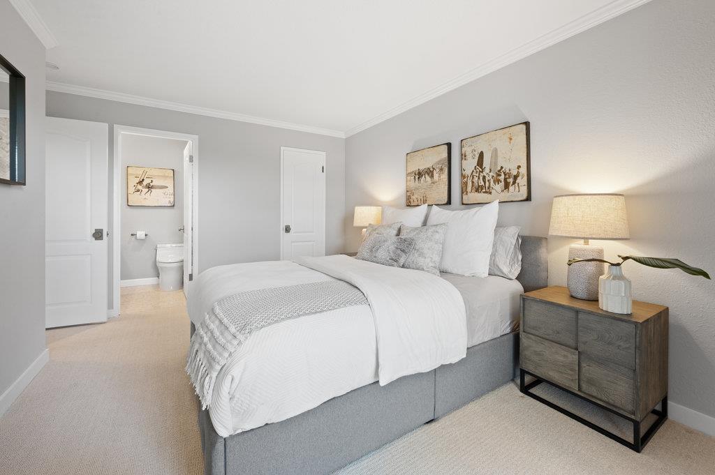 415 Roberts Road Pacifica, CA 94044 - Photo 49 of 69 a spacious bedroom with a bed and a night stand