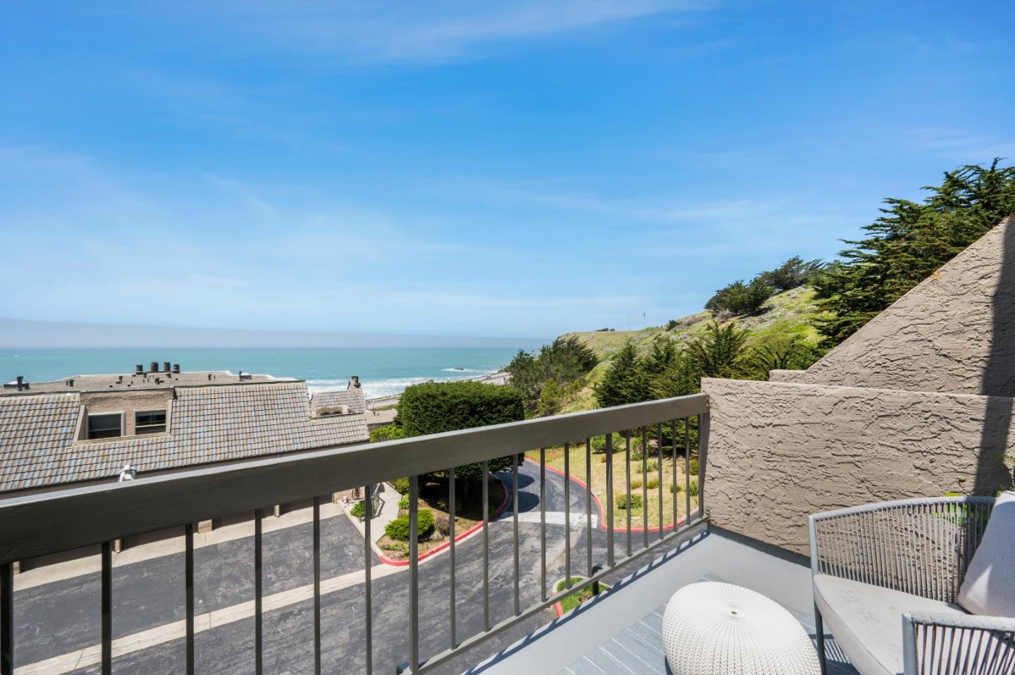 415 Roberts Road Pacifica, CA 94044 - Photo 10 of 69 a view of a balcony with wooden floor and fence