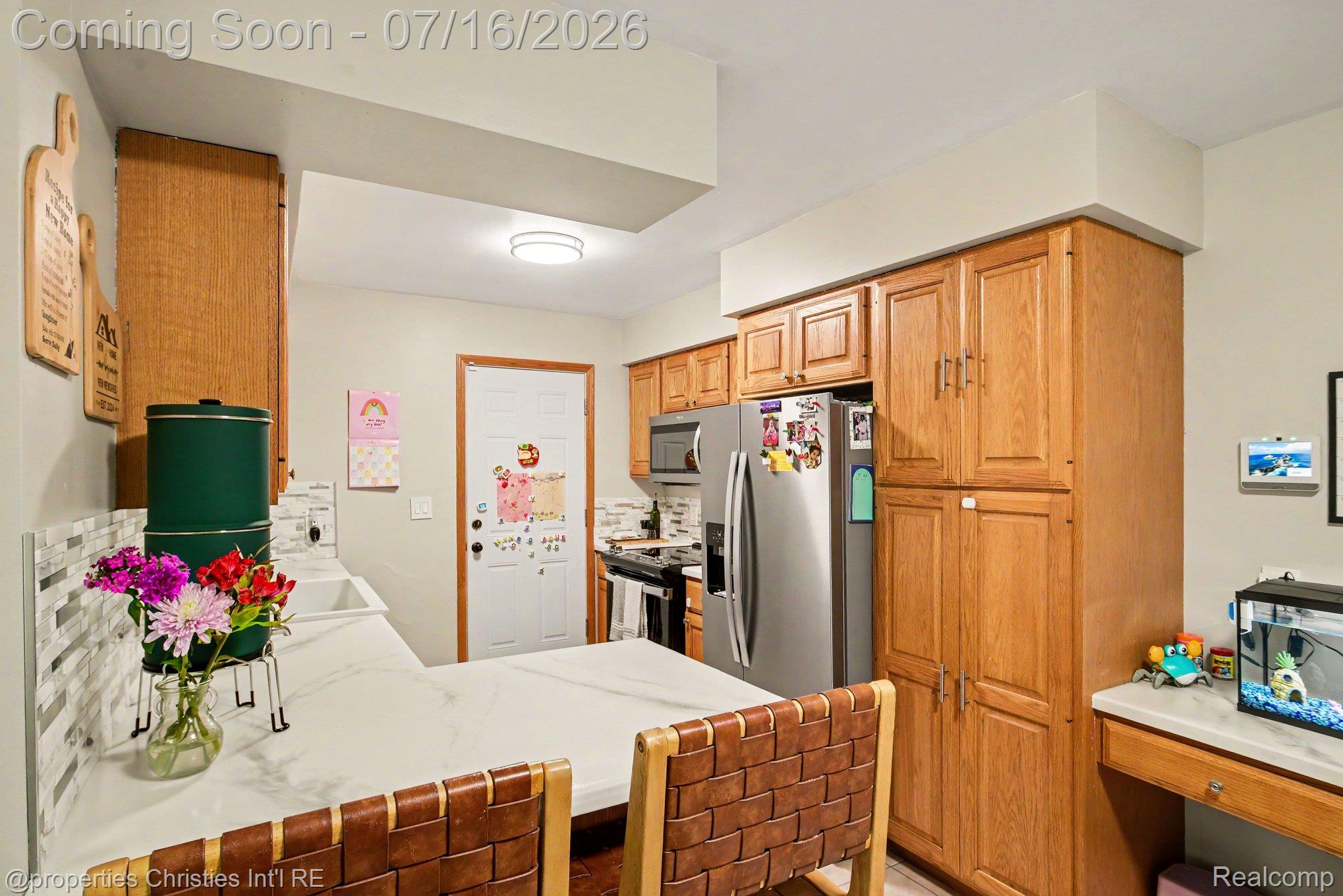 3304 Riverside Drive Port Huron, MI 48060 - Photo 6 of 26 Kitchen featuring wood cabinetry and stainless steel appliances