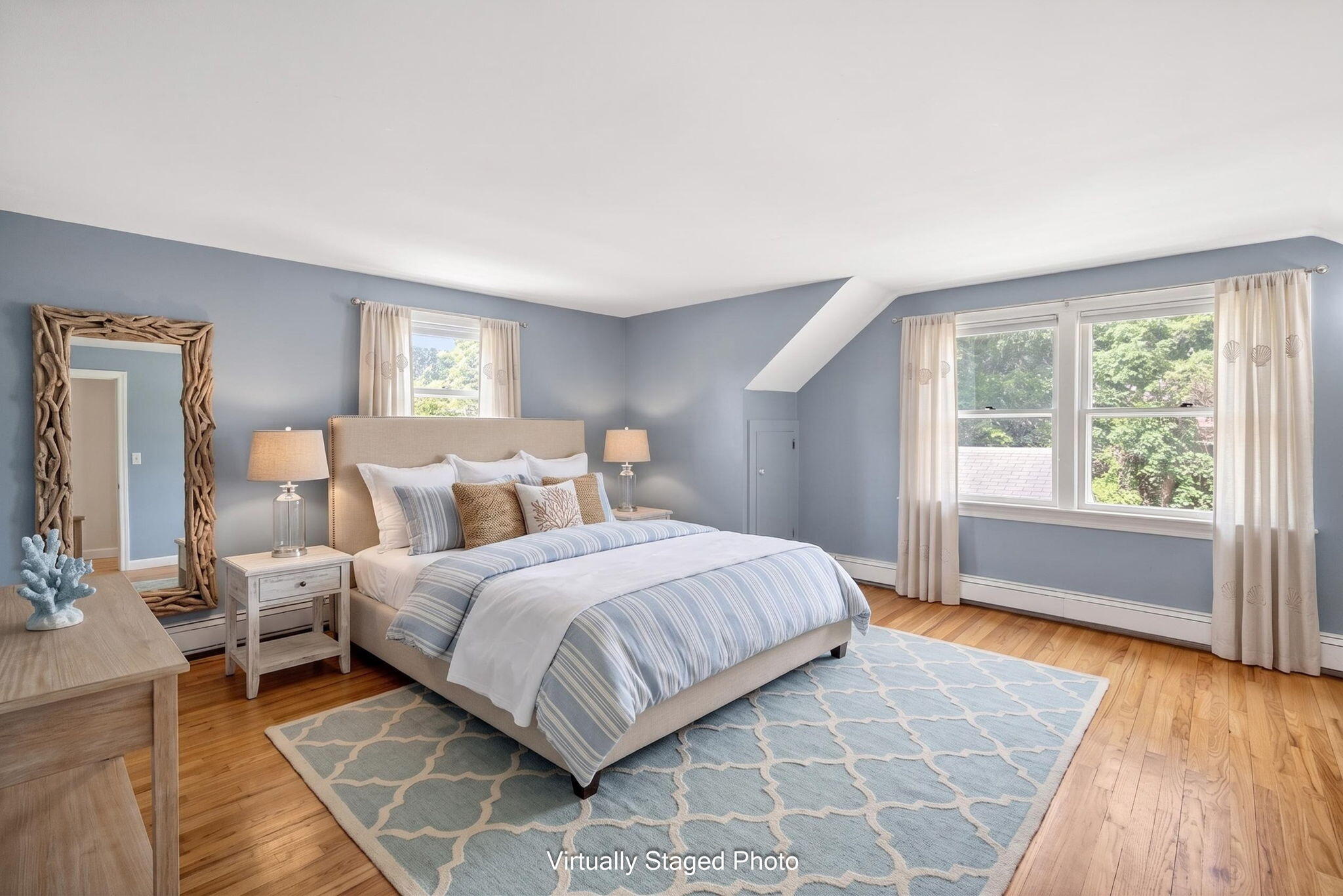 23 Nickerson Road Orleans, MA 02653 - Photo 22 of 54 a bedroom with a large bed and a window