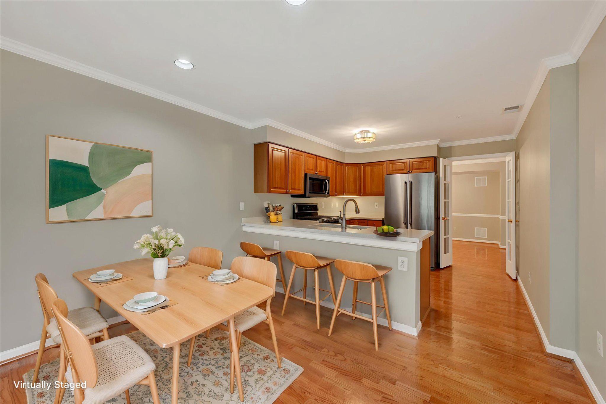 12310 Rosslare Ridge Road, Unit 405 Lutherville-Timonium, MD 21093 - Photo 16 of 36 Virtually staged breakfast room.