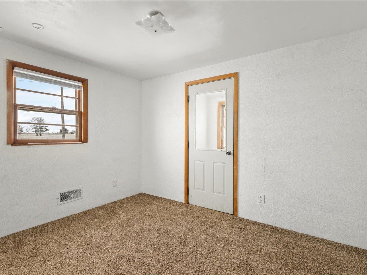 4381 Safford Road Rockford, IL 61101 - Photo 13 of 21 an empty room with windows