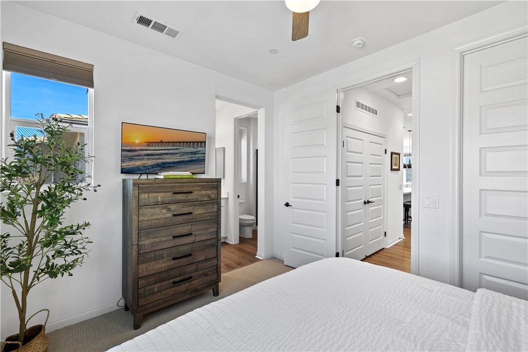 821 Cornelia Way Rancho Mission Viejo, CA 92694 - Photo 12 of 61 a bedroom with a bed and a potted plant