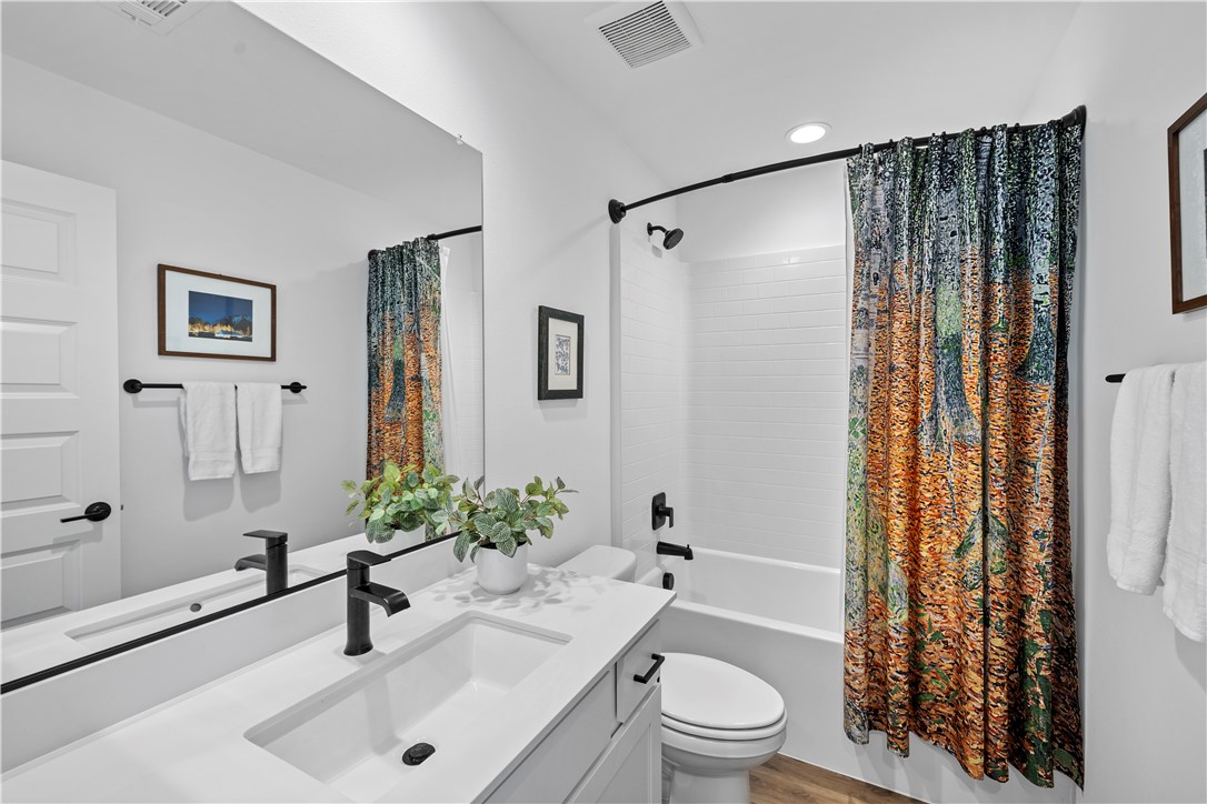 821 Cornelia Way Rancho Mission Viejo, CA 92694 - Photo 18 of 61 a bathroom with a sink toilet and shower