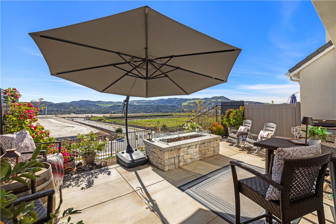 821 Cornelia Way Rancho Mission Viejo, CA 92694 - Photo 2 of 61 a view of an outdoor sitting area with swimming pool