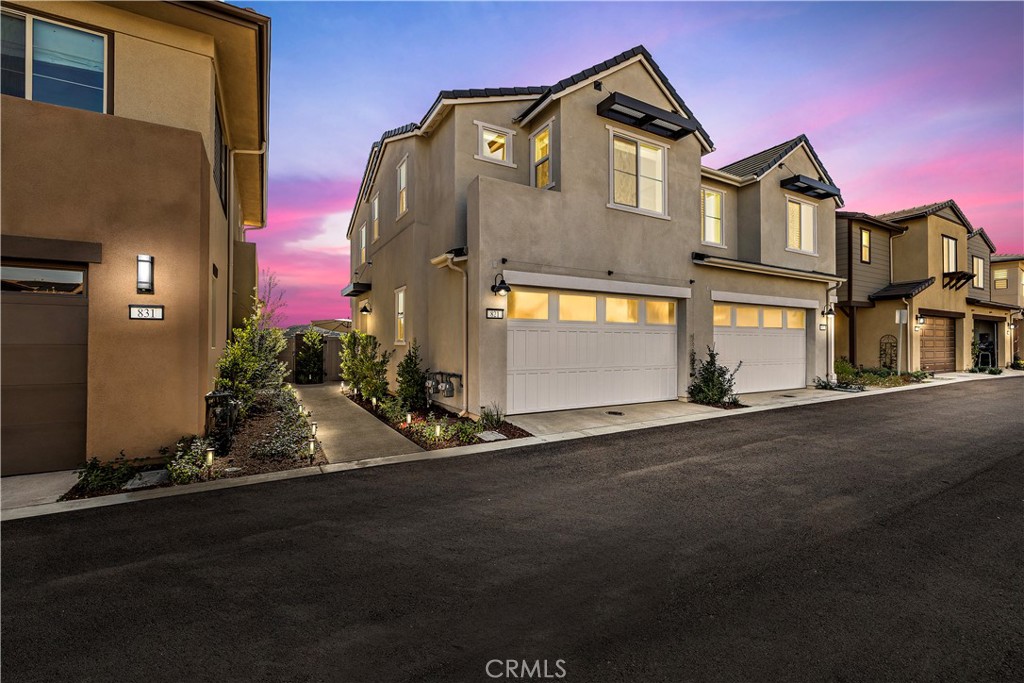 821 Cornelia Way Rancho Mission Viejo, CA 92694 - Photo 21 of 61 a front view of a house with a yard