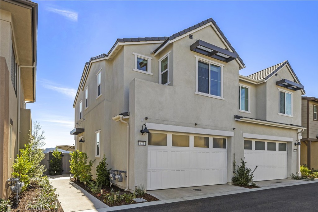 821 Cornelia Way Rancho Mission Viejo, CA 92694 - Photo 24 of 61 a front view of a house with a yard
