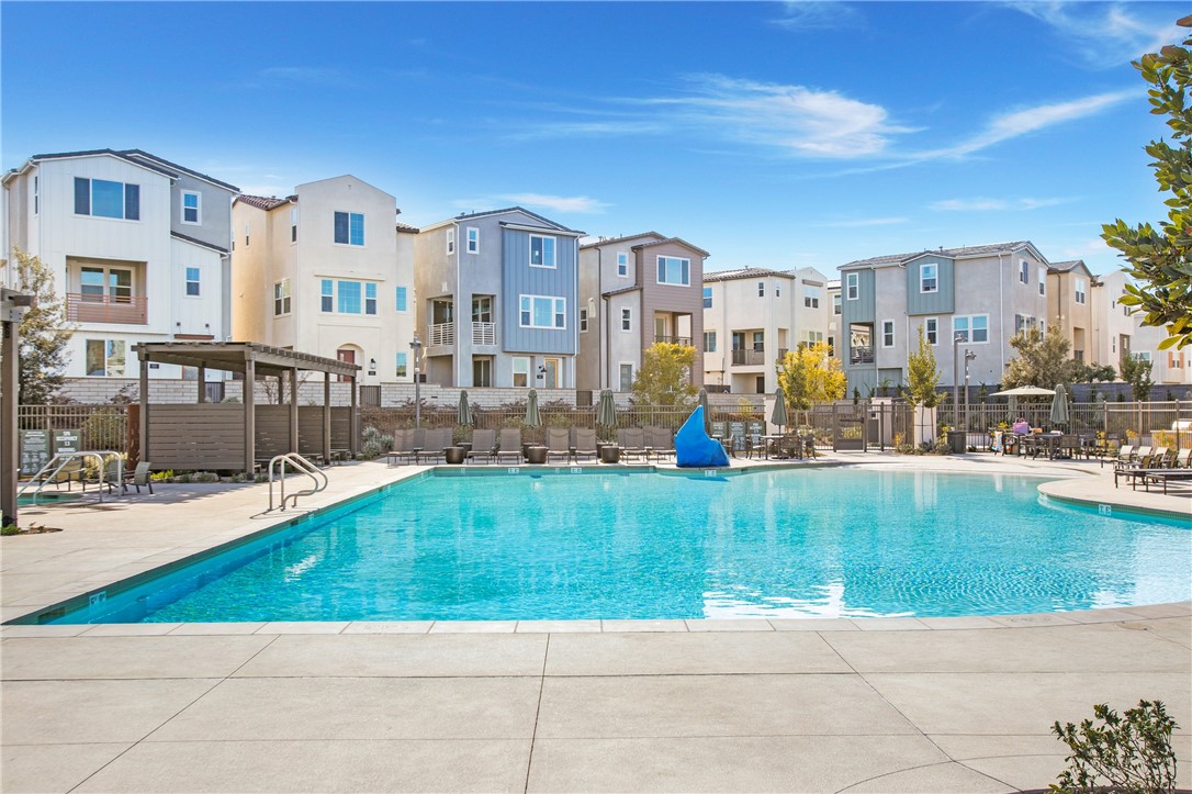 821 Cornelia Way Rancho Mission Viejo, CA 92694 - Photo 50 of 61 a swimming pool view with a outdoor seating
