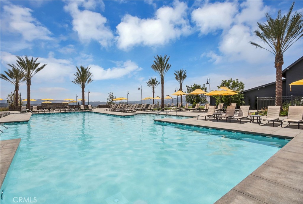 821 Cornelia Way Rancho Mission Viejo, CA 92694 - Photo 51 of 61 a view of a swimming pool and lounge chairs
