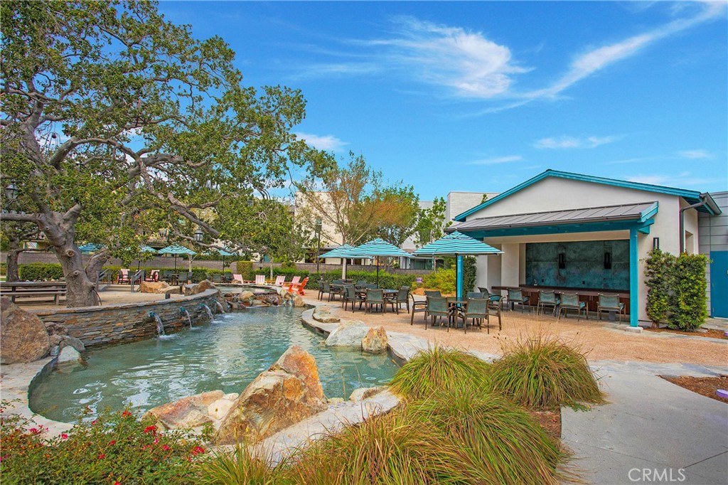 821 Cornelia Way Rancho Mission Viejo, CA 92694 - Photo 60 of 61 a swimming pool with outdoor seating and yard