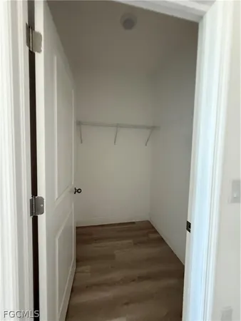 a bathroom with a shower a toilet and sink