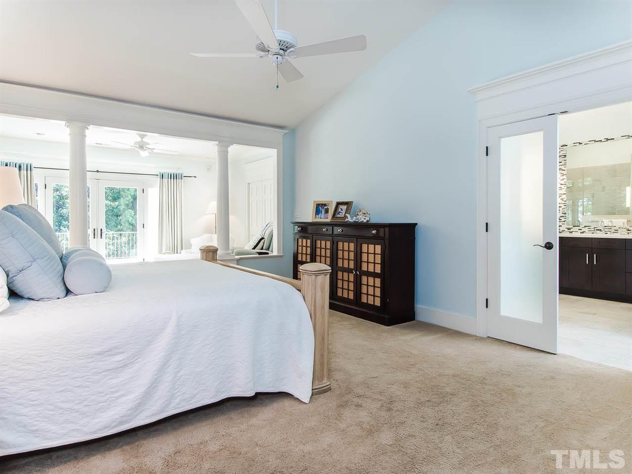 509 Lake Boone Trail Raleigh, NC 27608 - Photo 12 of 25 a bedroom with a bed and large windows
