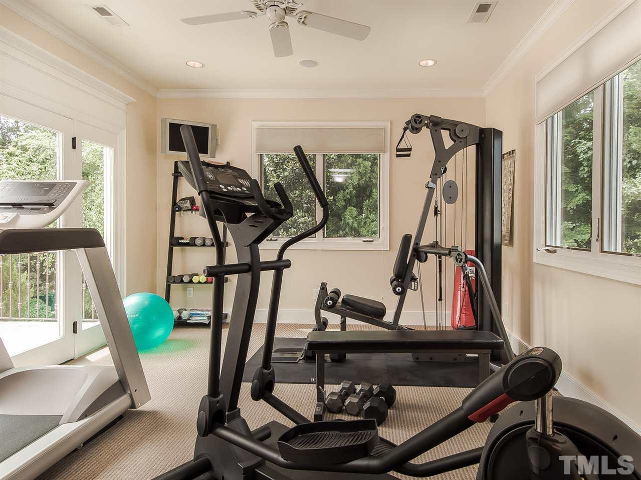 509 Lake Boone Trail Raleigh, NC 27608 - Photo 16 of 25 a view of a room with gym equipment