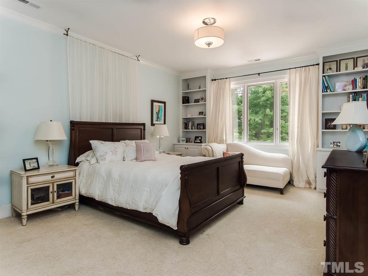 509 Lake Boone Trail Raleigh, NC 27608 - Photo 18 of 25 a living room with a bed furniture and a large window