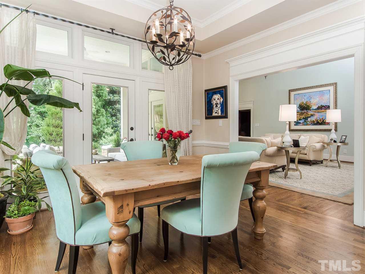509 Lake Boone Trail Raleigh, NC 27608 - Photo 7 of 25 a view of a dining room with furniture window and outside view