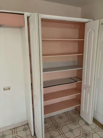 a view of a window in an empty room