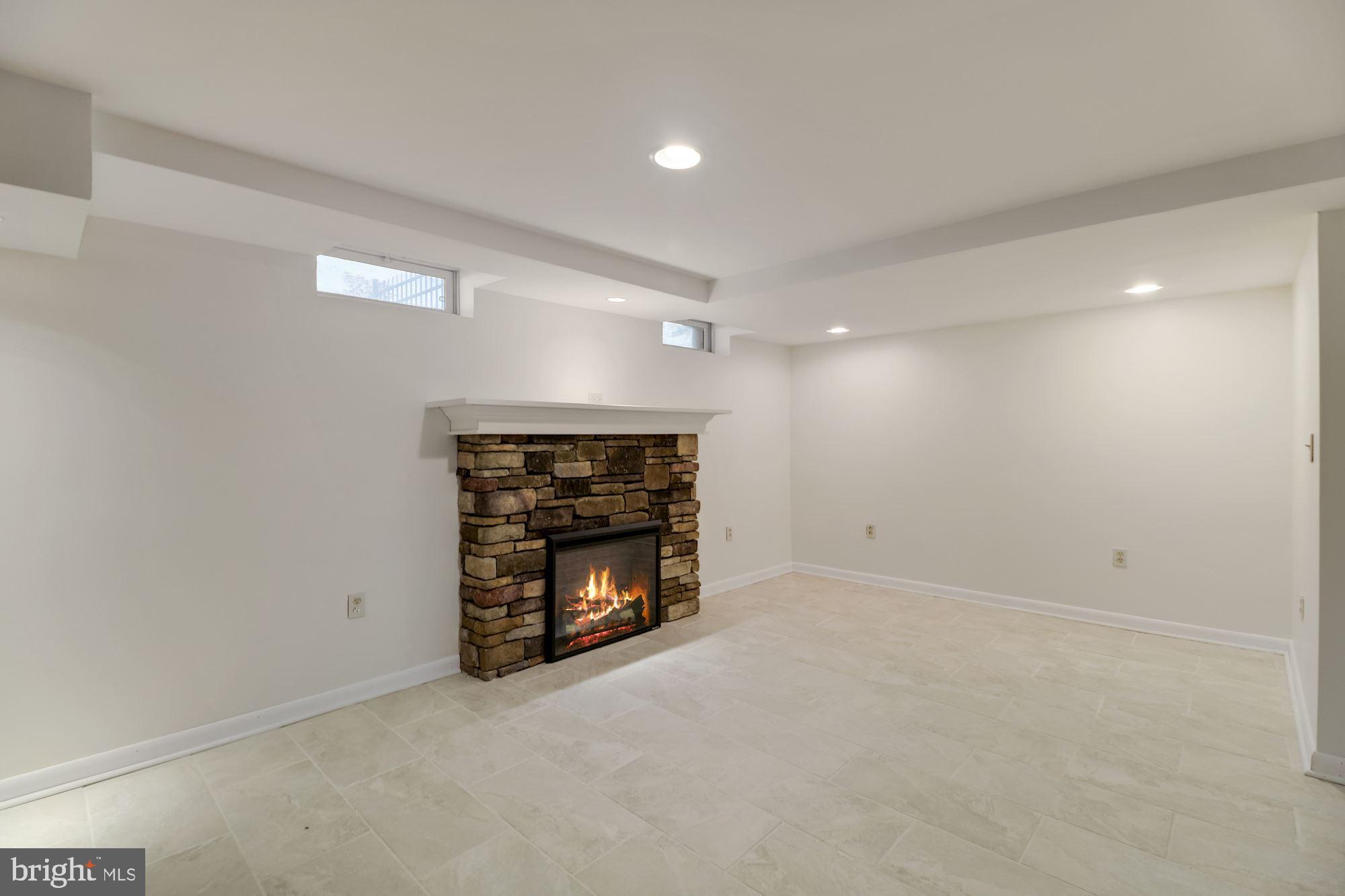 1306 Welsh Road Lansdale, PA 19446 - Photo 13 of 17 Basement electric fireplace