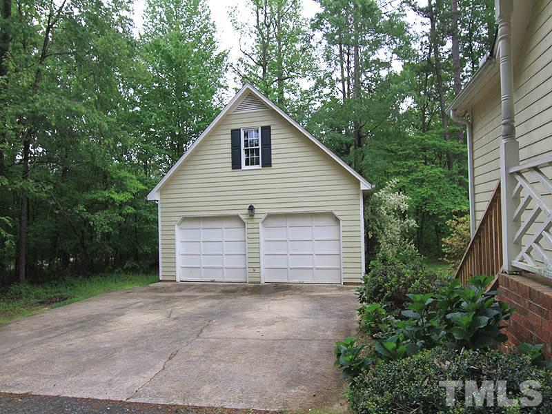 103 Calms Way Rougemont, NC 27572 - Photo 2 of 13 a view of backyard of house and trees