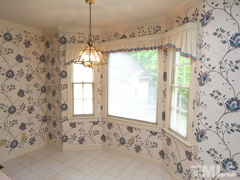 103 Calms Way Rougemont, NC 27572 - Photo 6 of 13 a bathroom with a bathtub and shower