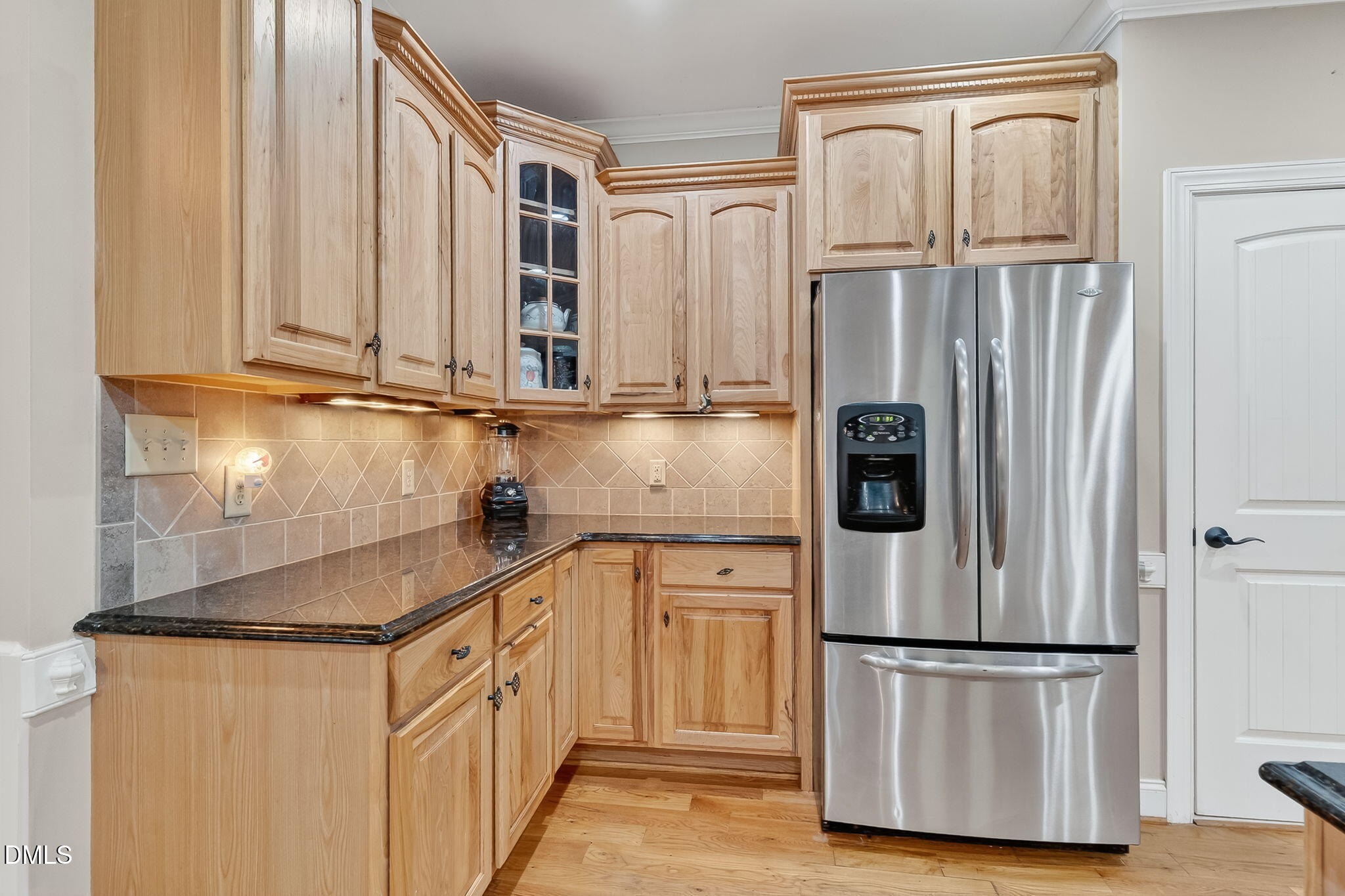 6570 Highway 231 Middlesex, NC 27557 - Photo 17 of 63 a kitchen with stainless steel appliances granite countertop a refrigerator and a sink
