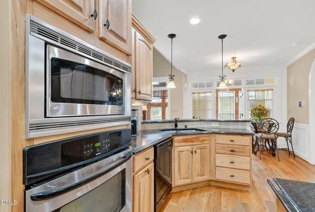 a spacious bedroom with a bed and a large window