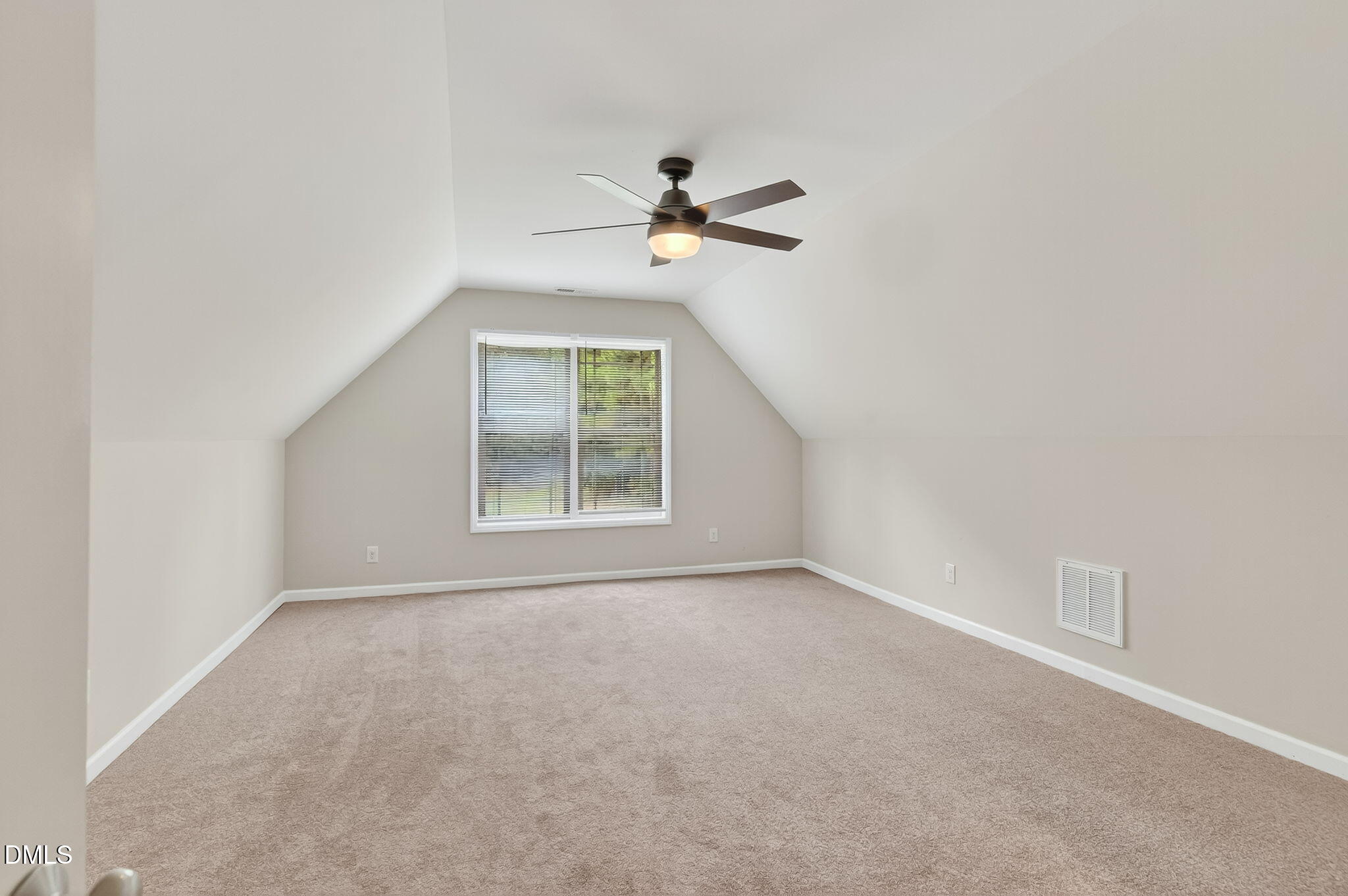 6570 Highway 231 Middlesex, NC 27557 - Photo 36 of 63 an empty room with windows and fan