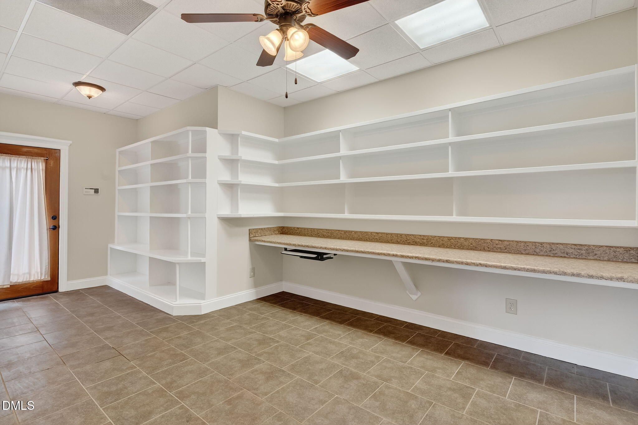 6570 Highway 231 Middlesex, NC 27557 - Photo 46 of 63 a view of an empty room with a cabinet and a window