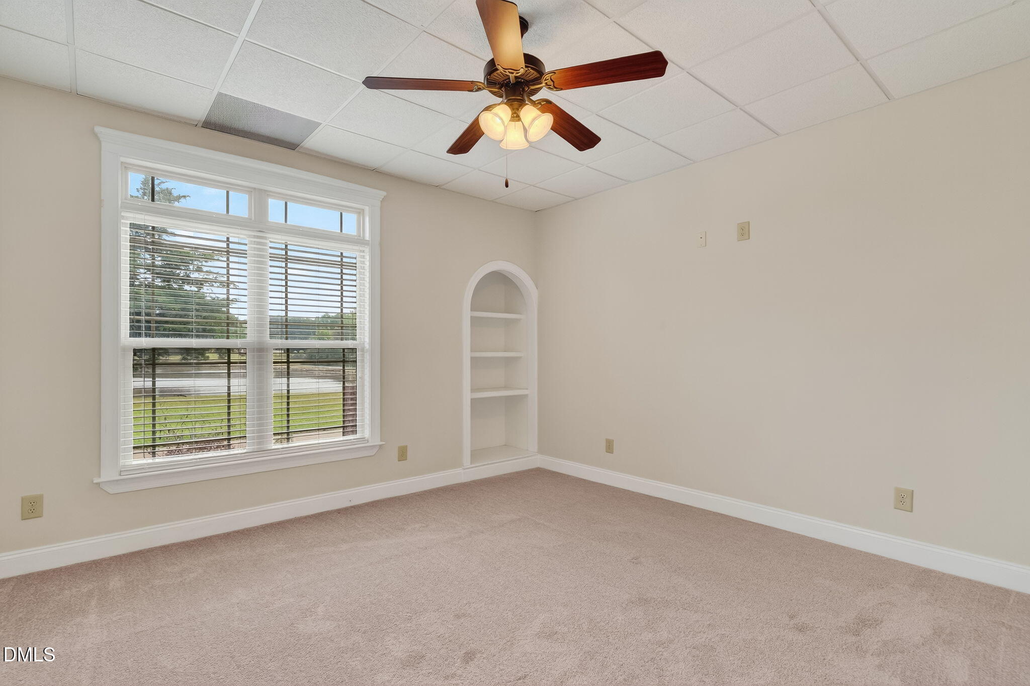 6570 Highway 231 Middlesex, NC 27557 - Photo 51 of 63 an empty room with windows and fan
