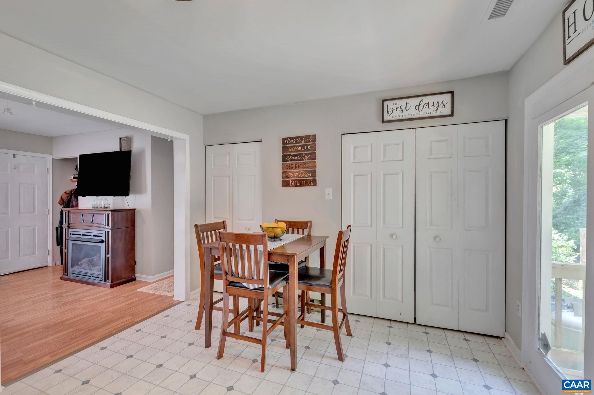 2597 Ridge Road Palmyra, VA 22963 - Photo 15 of 28 a view of a dining room with furniture window and wooden floor