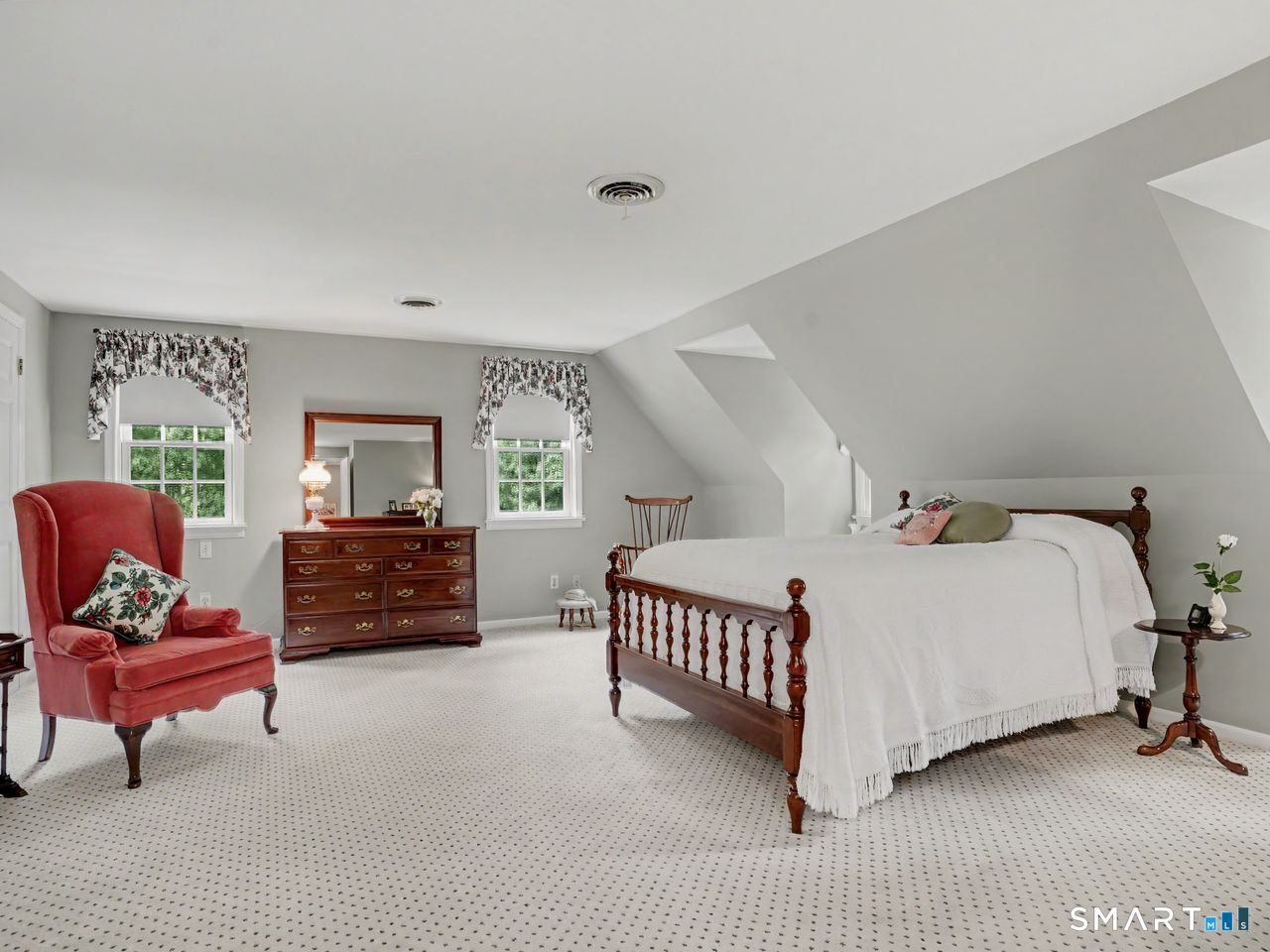 86 Fire Hill Road Redding, CT 06896 - Photo 20 of 36 a bedroom with furniture and a potted plant