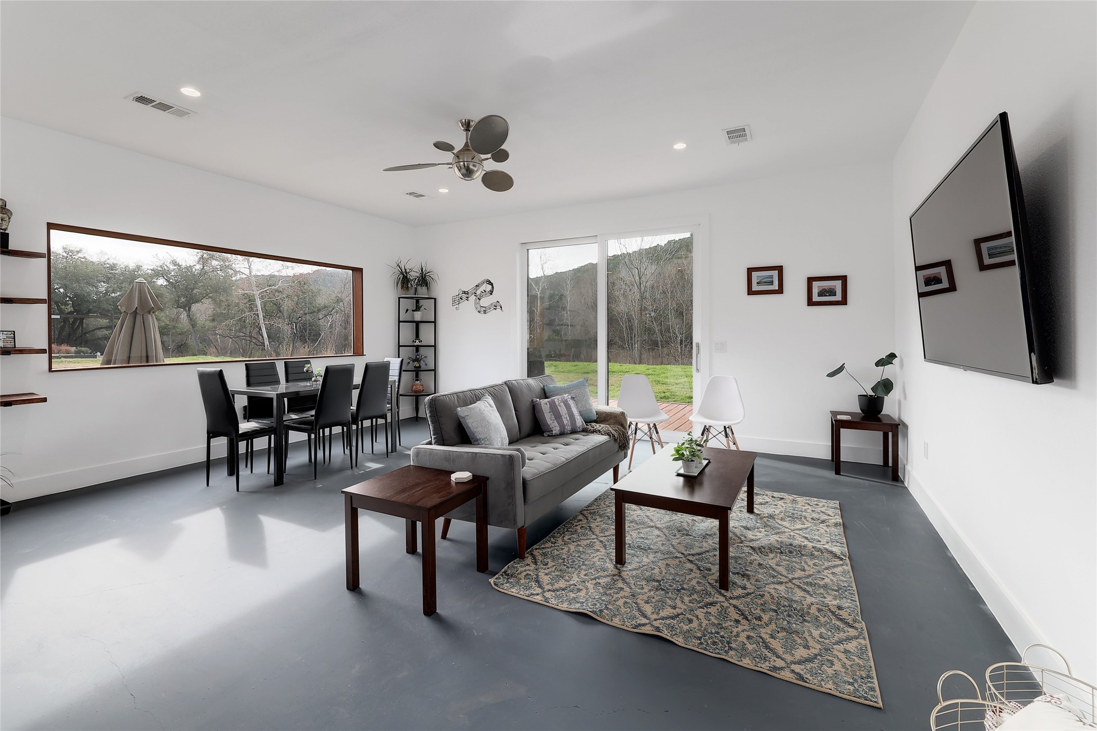 7001 Ranch Road 2222 Austin, TX 78730 - Photo 10 of 18 A spacious, open-plan living area with modern finishes and natural light.