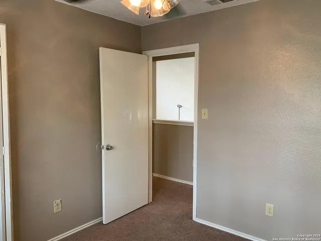 a view of an empty room with window