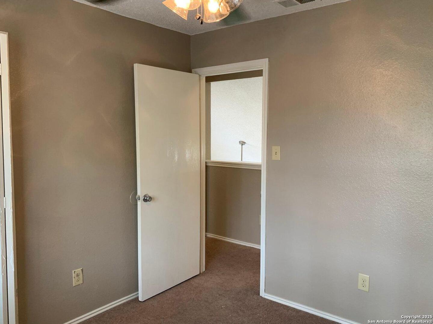 718 Meadow Top Converse, TX 78109 - Photo 12 of 15 a view of an empty room with window