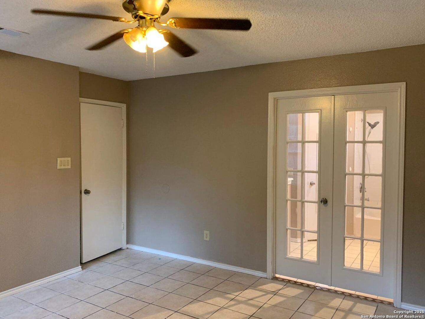 718 Meadow Top Converse, TX 78109 - Photo 5 of 15 a view of an empty room and window