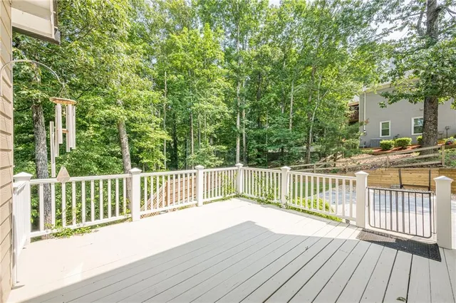 an aerial view of a house with a yard and garden