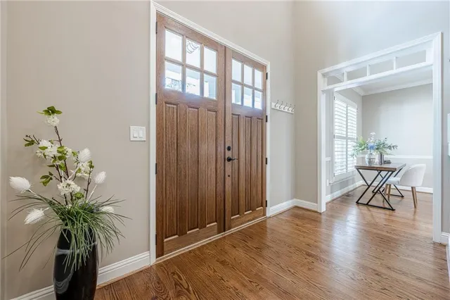 a living room with furniture fireplace and window