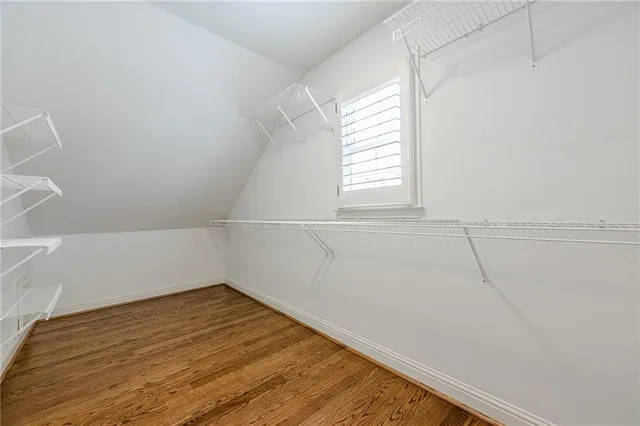 a bathroom with a toilet and shower
