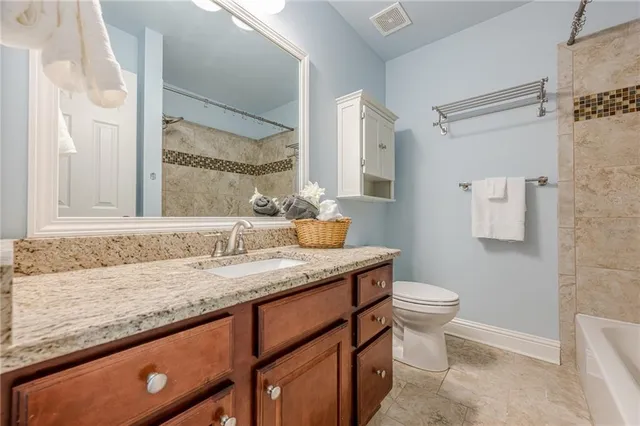 a view of a room with window and cabinet