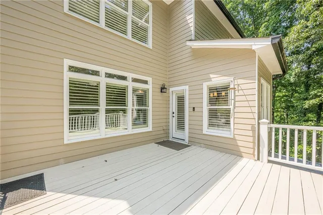 a sign that is in front of flowers