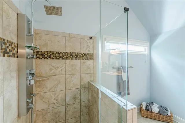 a view of a house with a door and balcony